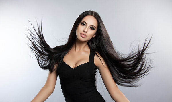 Beautiful model with smooth flying hair