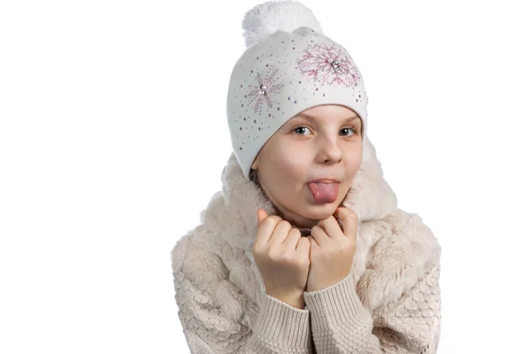 Menina bonito em roupas quentes no fundo branco — Fotografia de Stock