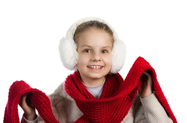 Pretty joyful little girl in warm winter things with knitted scarf — Stock Photo, Image