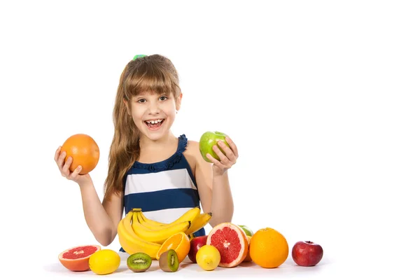 Girl with fruit on white background — Stock Photo, Image