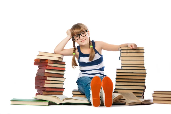 Girl with lot of books, isolated on white — Stock Photo, Image