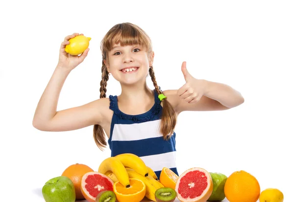 Girl with fruit on white background — Stock Photo, Image