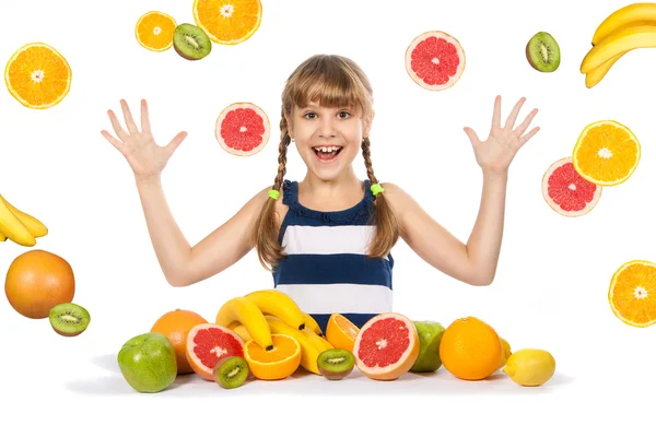 Radostné dívka s ovocem na bílém pozadí — Stock fotografie