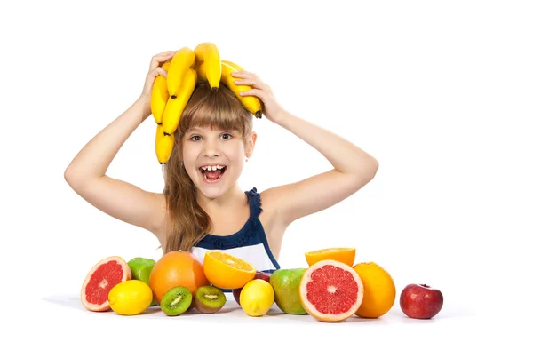 Girl with fruit and bananas on her head — Stock Photo, Image