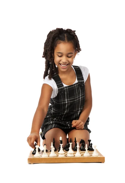 Cute girl playing chess on white — Stock Photo, Image