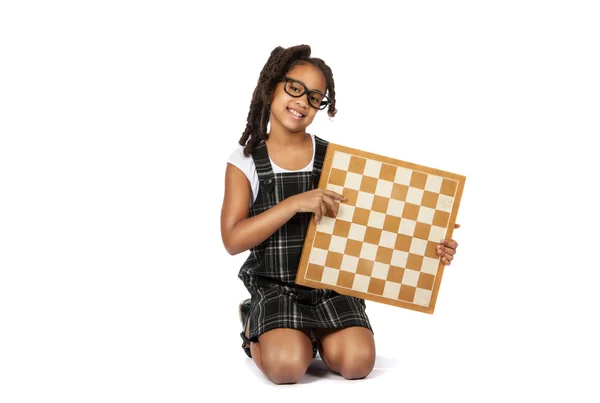Smart girl in glasses with a chessboard — Stock Photo, Image