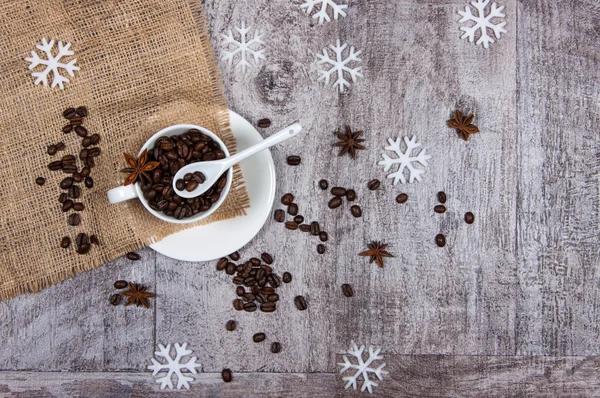 Cup with coffee beans — Stock Photo, Image