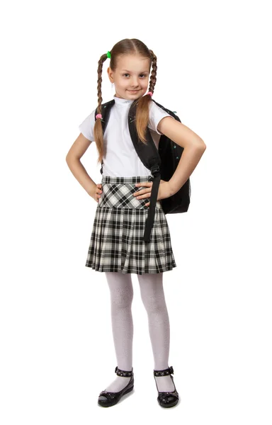 Menina em uniforme escolar com livros — Fotografia de Stock