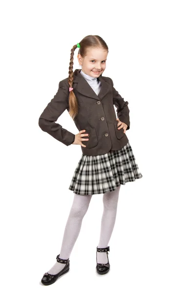 Bella bambina in uniforme scolastica con libri — Foto Stock