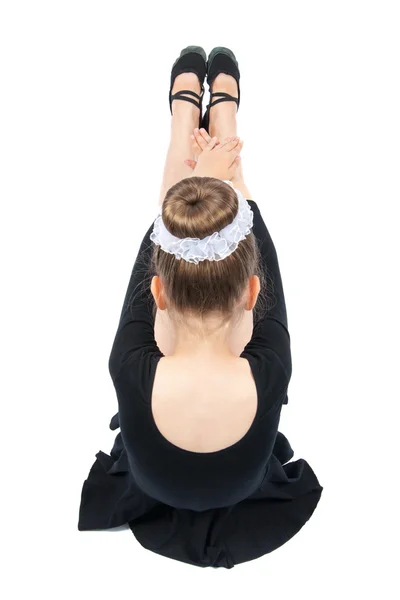 Happy girl performs gymnastic exercise — Stock Photo, Image