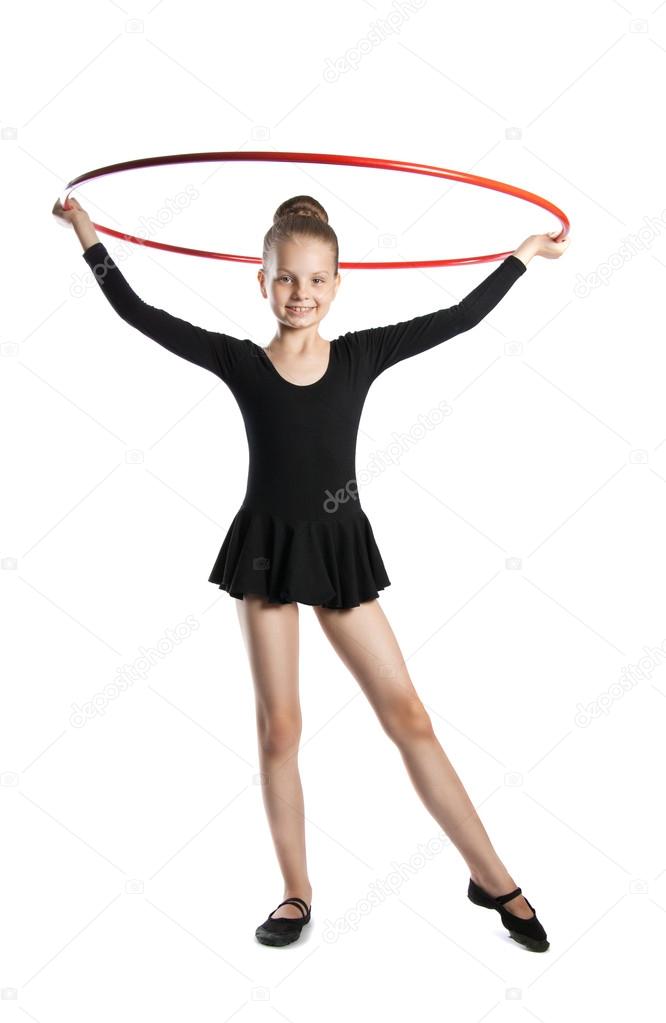 Happy girl gymnast with a hoop