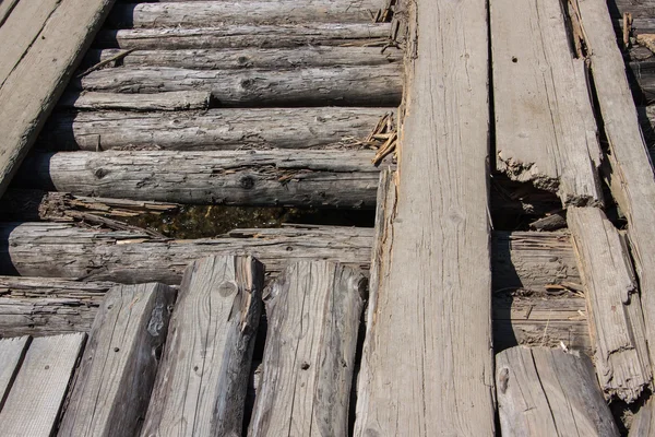 Old wooden texture. rotten logs and boards. — Stock Photo, Image