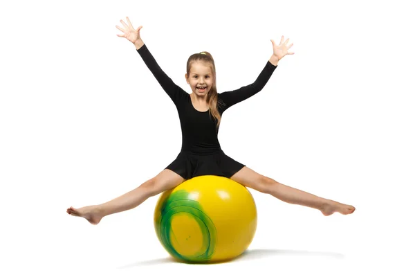 Girl is engaged in gymnastics. — Stock Photo, Image