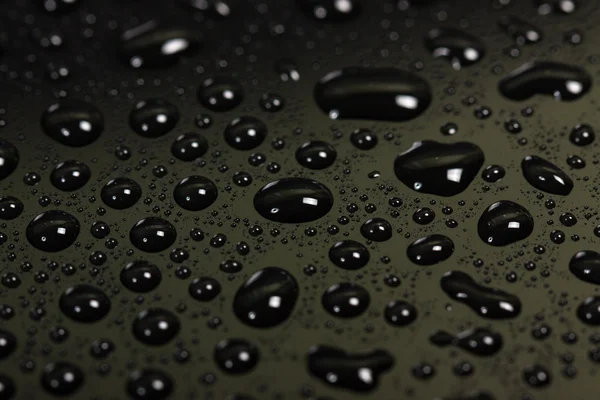 stock image drops of water on a dark background. beautiful abstract texture. macro