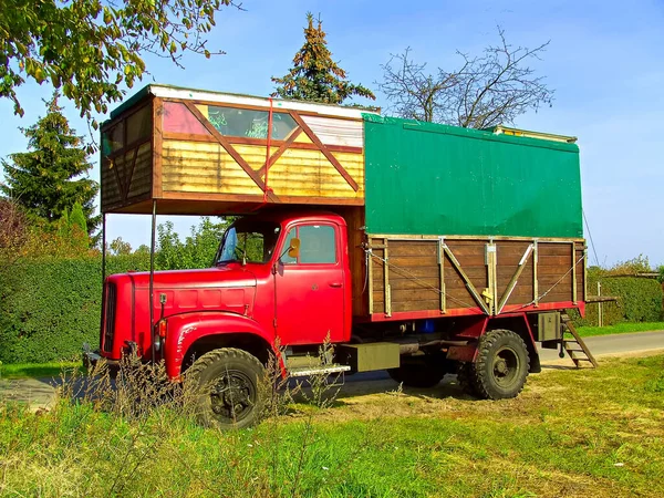 A converted truck while camping in nature