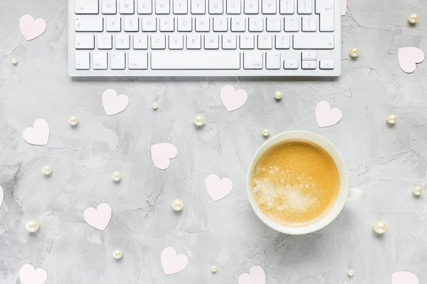 Computer keyboard, coffee, pink hearts and pearls