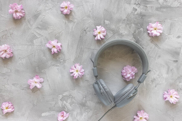 Headphones on gray spring or summer background