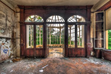 Abandoned room with view through beautiful broken conservatory clipart
