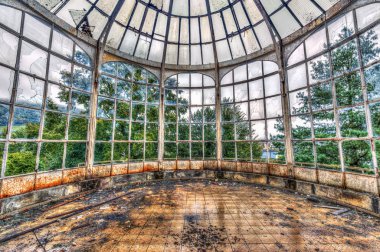 Broken conservatory in an abandoned manor clipart