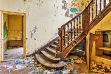 Decaying staircase in an abandoned manor clipart