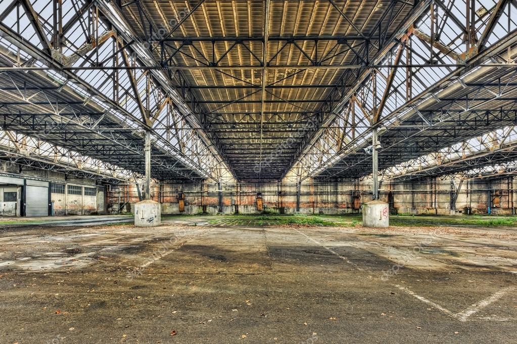 Empty warehouse in an abandoned factory ⬇ Stock Photo, Image by