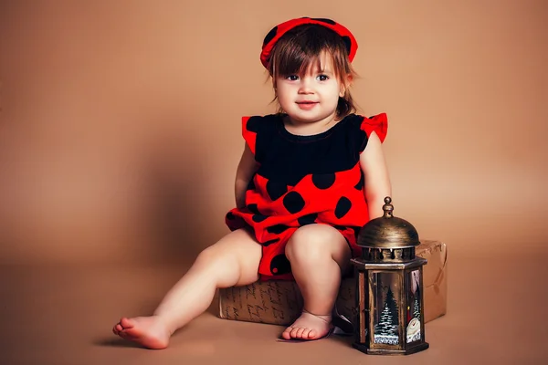 Child dressed as a ladybug — Stock Photo, Image