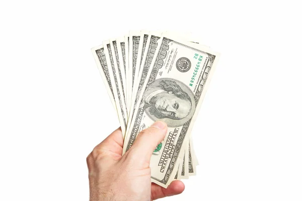 Beyaz arka plan üzerinde izole yüz dolarlık banknot tutan erkek el — Stok fotoğraf