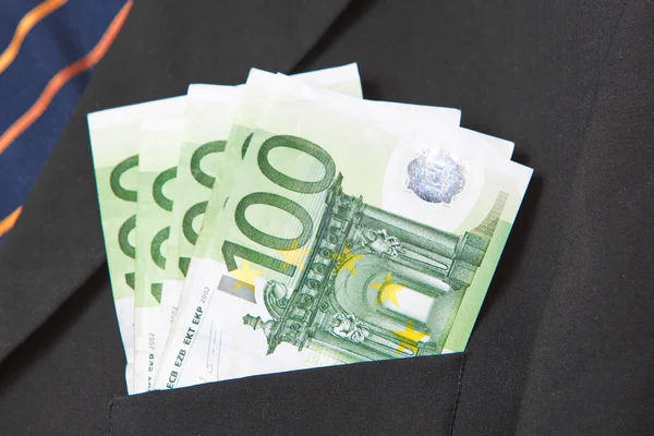 Euro i fickan på en kostym — Stockfoto