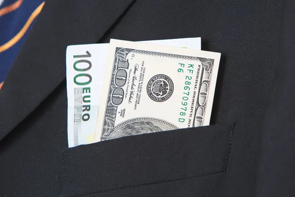 Dollars américains et Euros billets en costume fond de poche — Photo