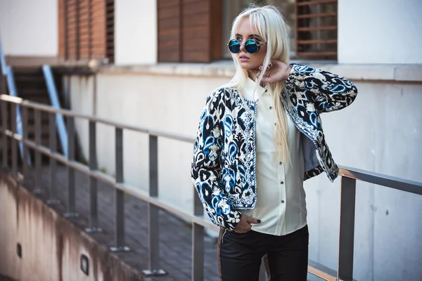 Stylish girl in blue sunglasses outdoors — Stock Photo, Image