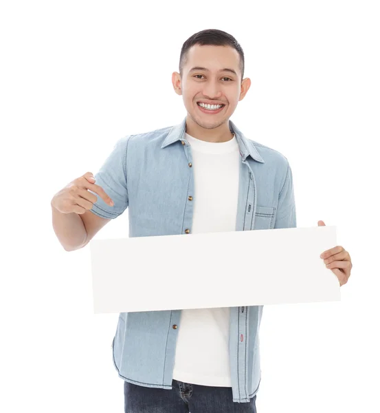 Hombre sosteniendo y apuntando en blanco —  Fotos de Stock