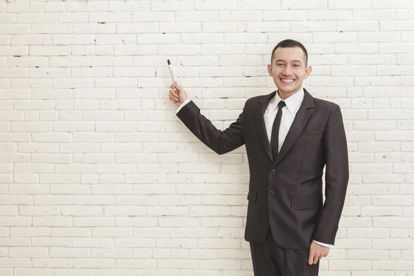 Businessman while pointing — Stock Photo, Image