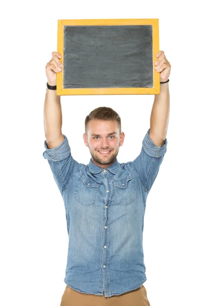 Hombre sosteniendo pizarra en blanco — Foto de Stock