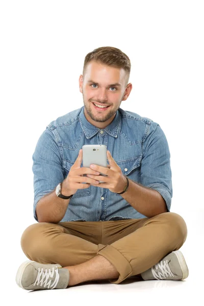 Jonge man glimlacht — Stockfoto