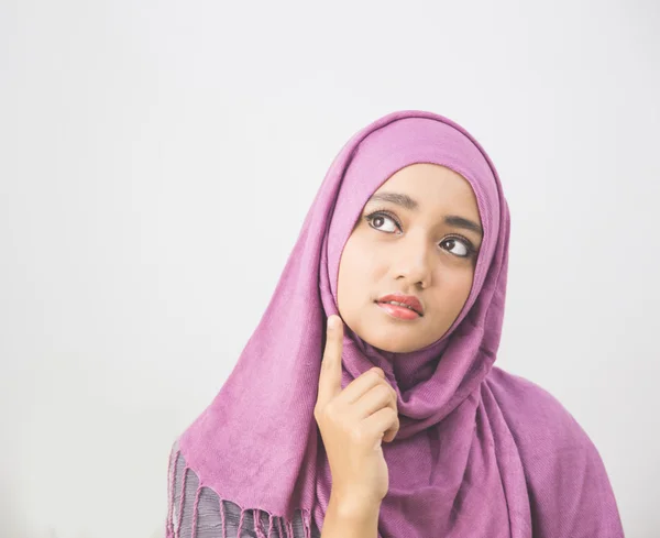 Portrait of young woman thinking — Stock Photo, Image