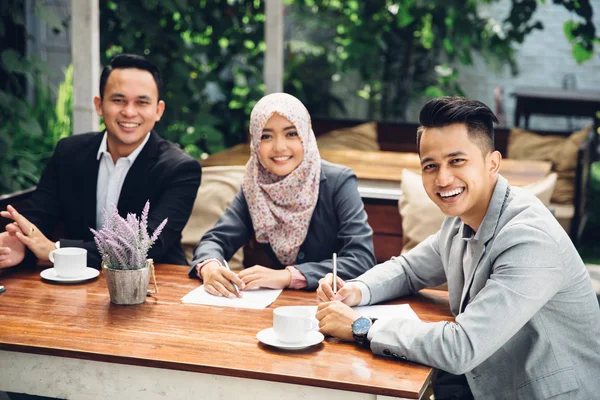 Business meeting in a cafe — Stock Photo, Image