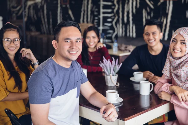 Friends having fun together in cafe — Stock Photo, Image