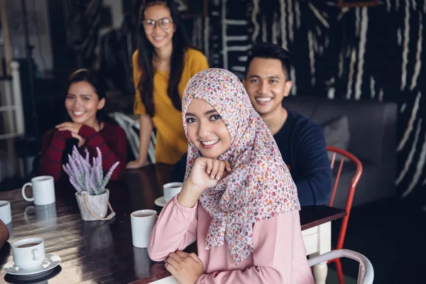 Friends having fun together in a cafe — Stock Photo, Image