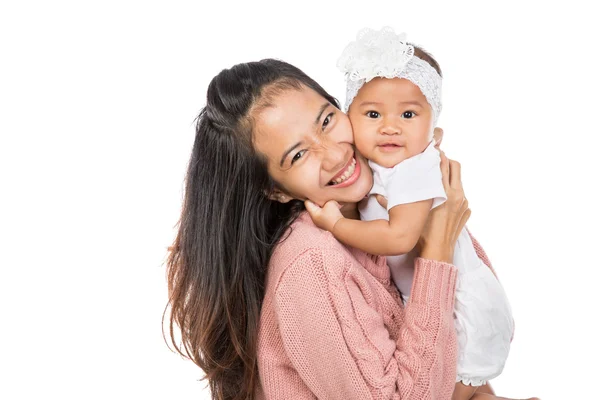 Mulher segurando bebê menina — Fotografia de Stock