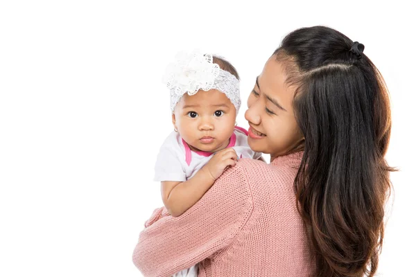 Mulher segurando bebê menina — Fotografia de Stock