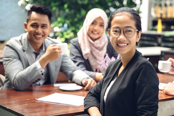 Creative business meeting in a cafe — Stock Photo, Image