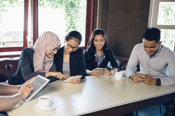 Creative business meeting in a cafe — Stock Photo, Image