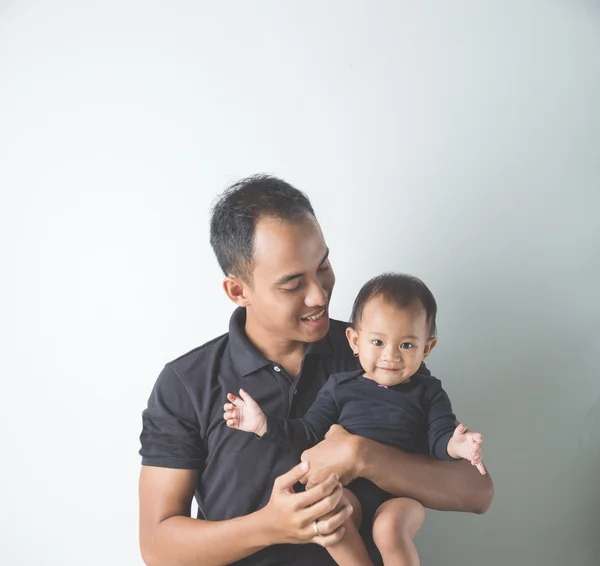 Father holding adorable baby — Stock Photo, Image