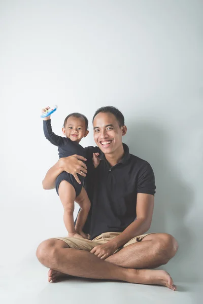 Father holding adorable baby — Stock Photo, Image