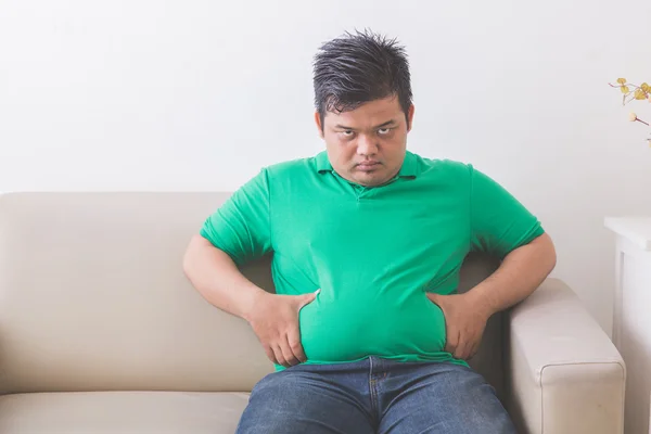 Man showing his big belly — Stock Photo, Image