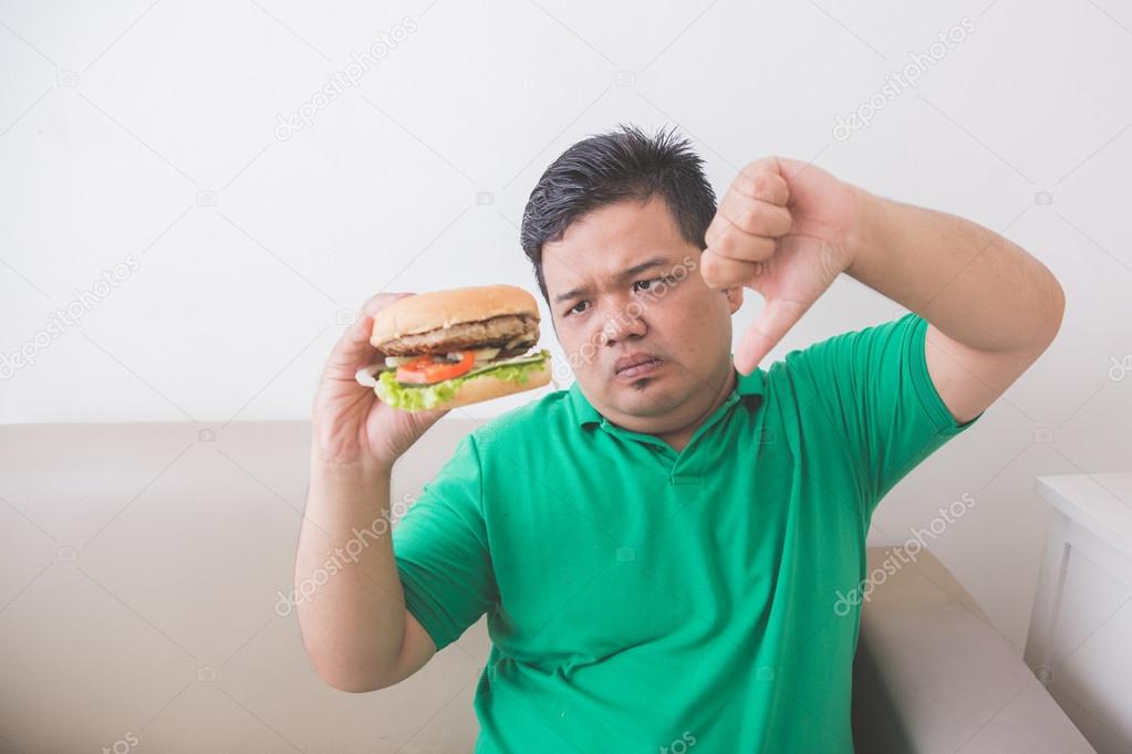 Overweight man stop eating junk food