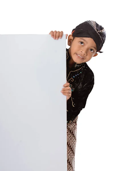 Portrait of a child in Javanese traditional clothes. — Stock Photo, Image