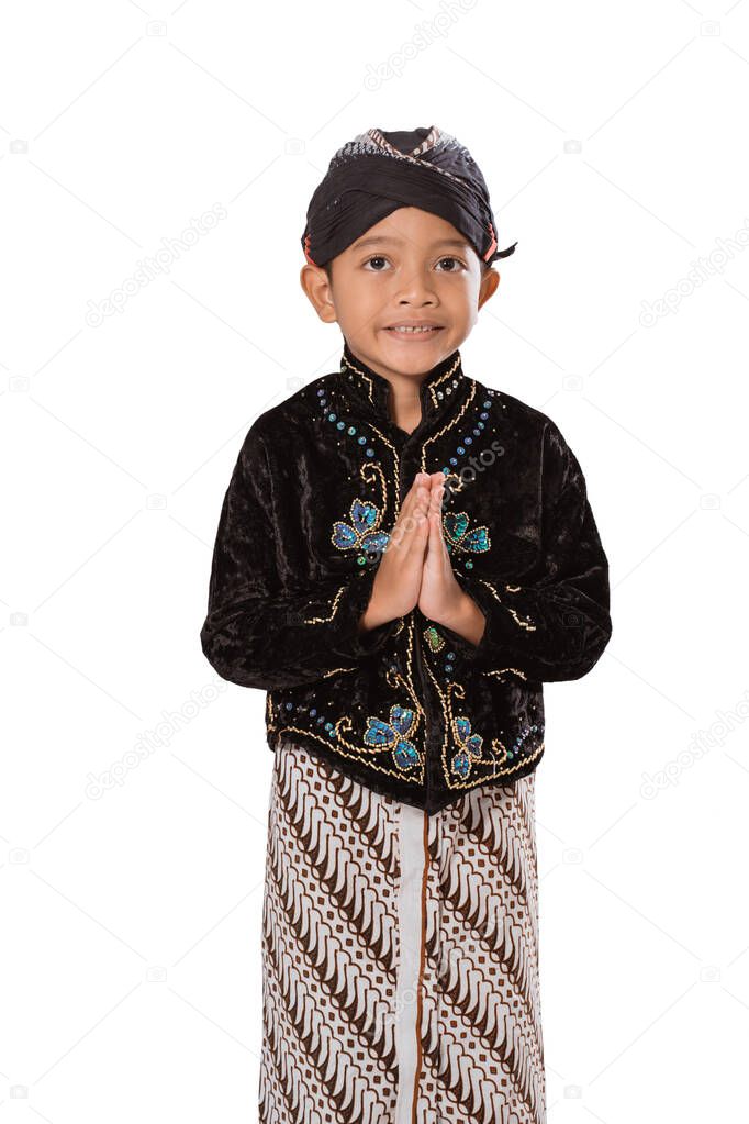 Portrait of a child in Javanese traditional clothes.