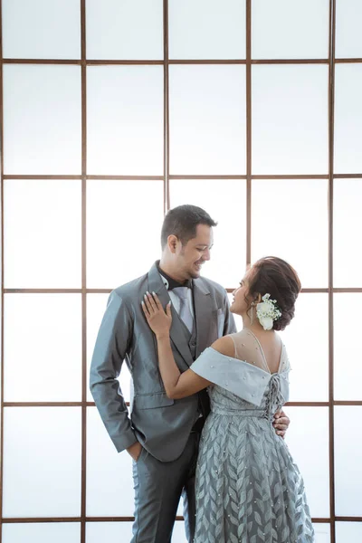 Portrait men and women wearing wedding dresses and suits. Couple photo concept — Stock Photo, Image