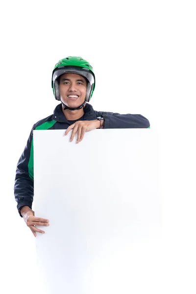 Uber rider with helmet holding blank white board — Stock Photo, Image